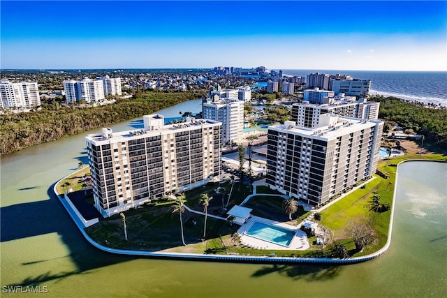 birds eye view of property featuring a water view