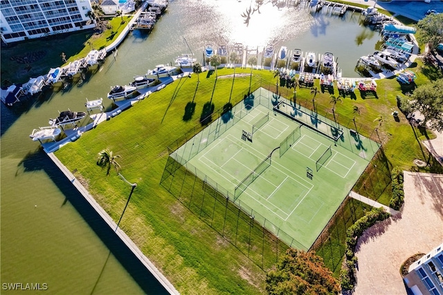 bird's eye view with a water view