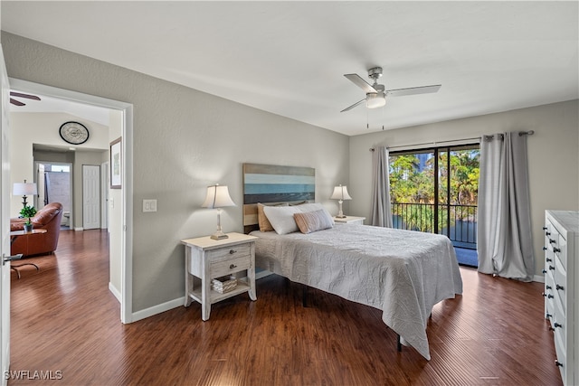 bedroom featuring access to exterior, dark hardwood / wood-style floors, and ceiling fan