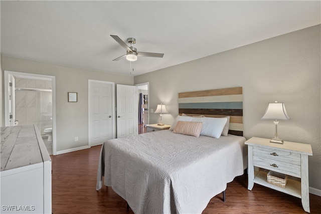 bedroom with connected bathroom, dark hardwood / wood-style floors, and ceiling fan