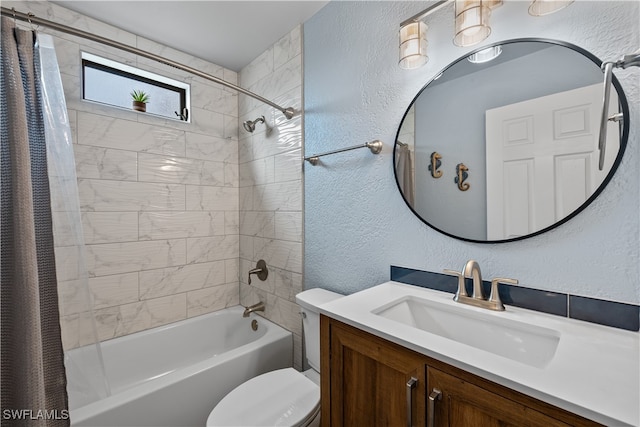 full bathroom with vanity, shower / bathtub combination with curtain, and toilet