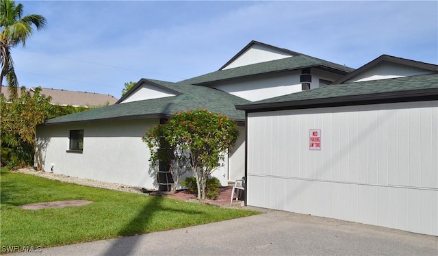 view of front of home with a front yard