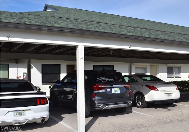 view of car parking with a carport