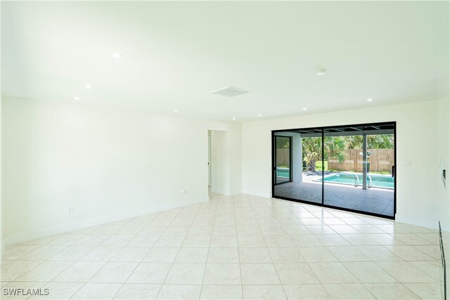 view of tiled spare room