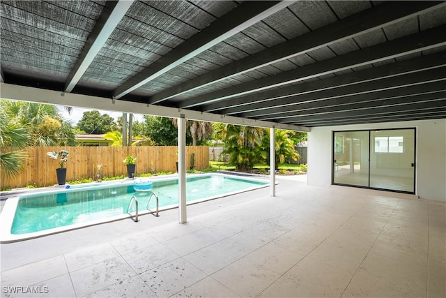 view of pool featuring a patio