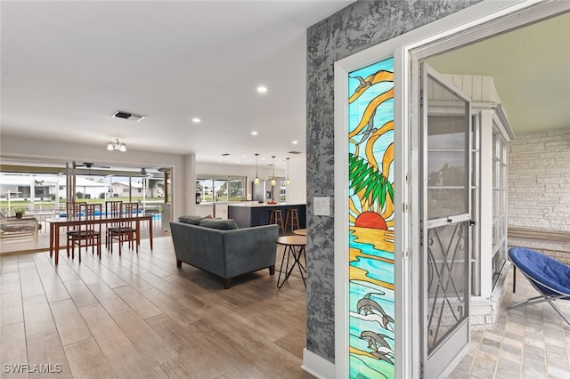 living room with french doors and hardwood / wood-style flooring