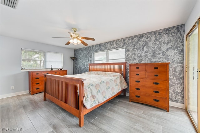 bedroom featuring ceiling fan and light wood-type flooring