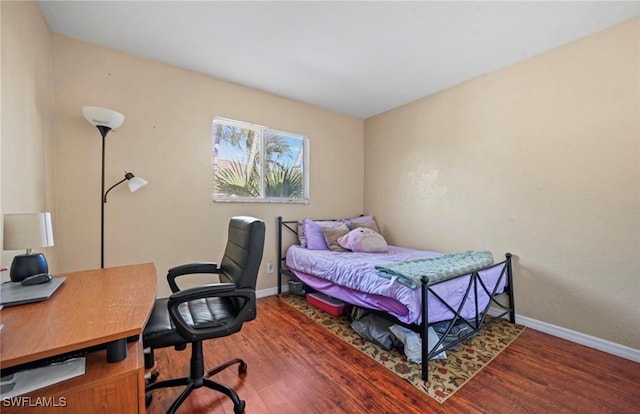 bedroom featuring hardwood / wood-style flooring