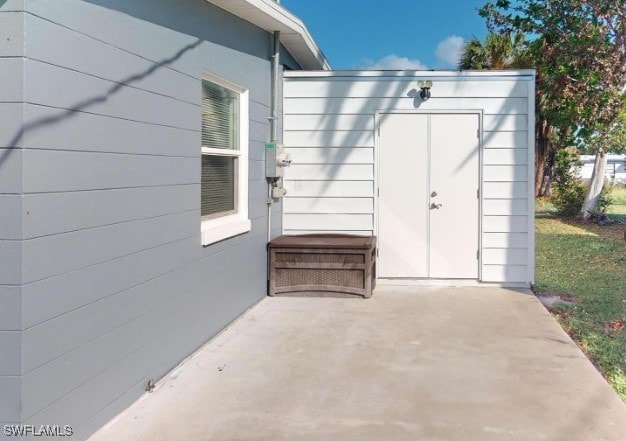 doorway to property featuring a patio