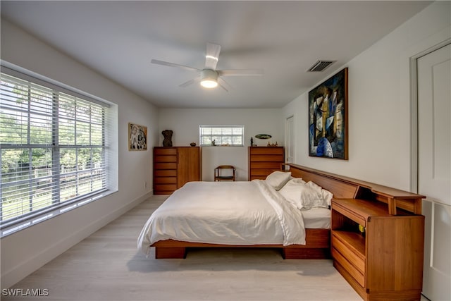 bedroom featuring ceiling fan and light wood-type flooring