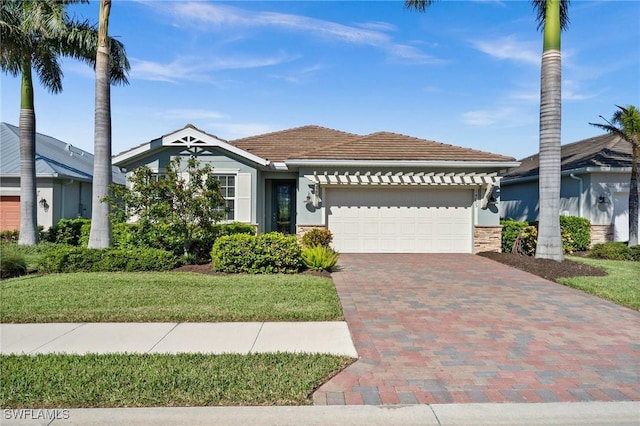 view of front of property with a garage