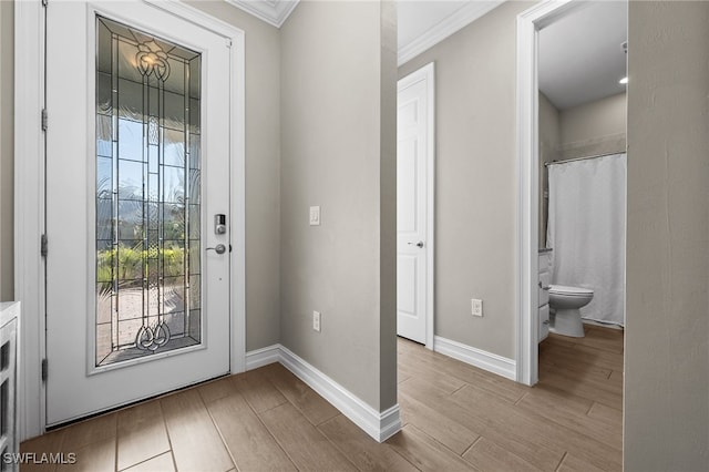 entryway with crown molding