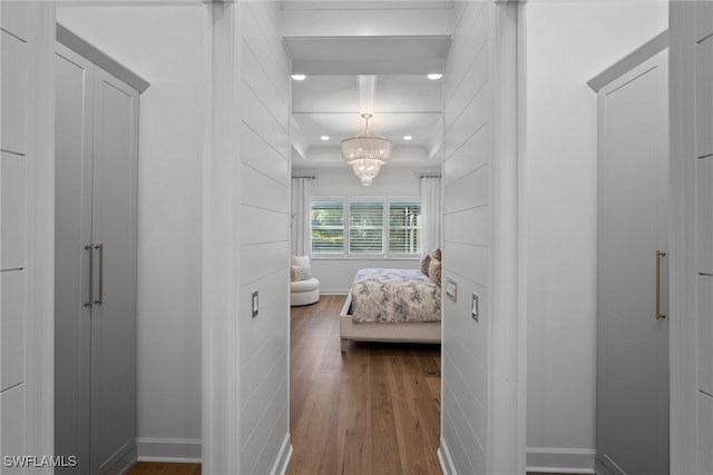 corridor with wood-type flooring