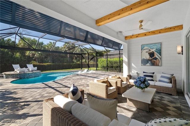 view of pool featuring a lanai, an outdoor living space, and a patio