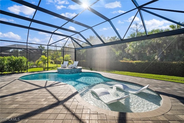 outdoor pool featuring a patio and glass enclosure