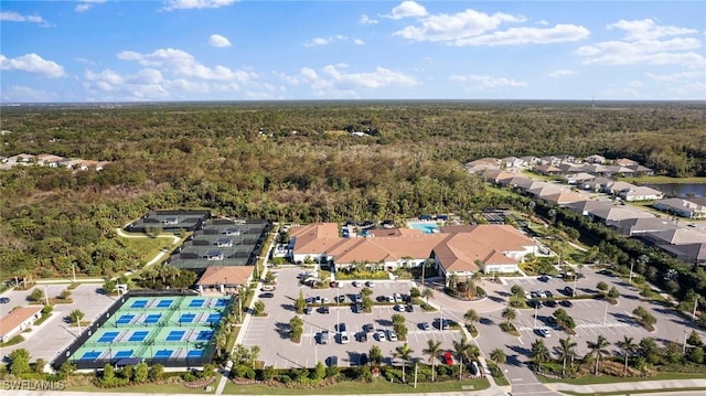 drone / aerial view with a view of trees