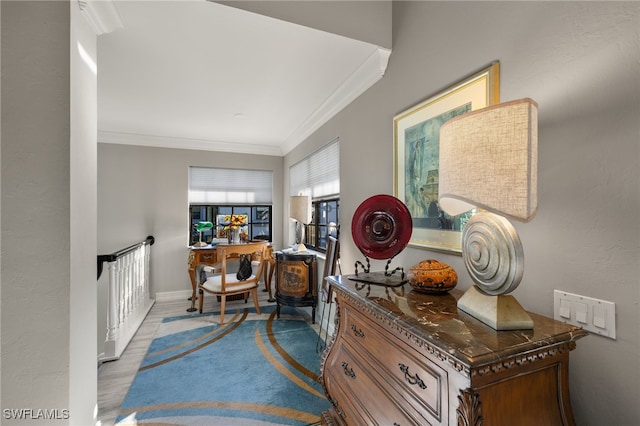 interior space with crown molding and wood-type flooring