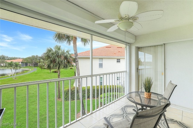 sunroom with ceiling fan and a healthy amount of sunlight