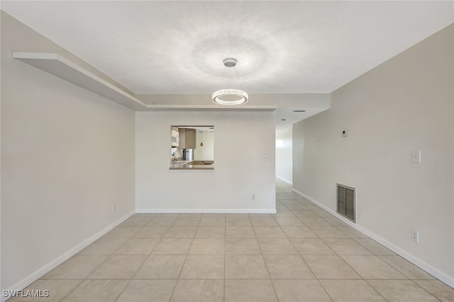 view of tiled spare room