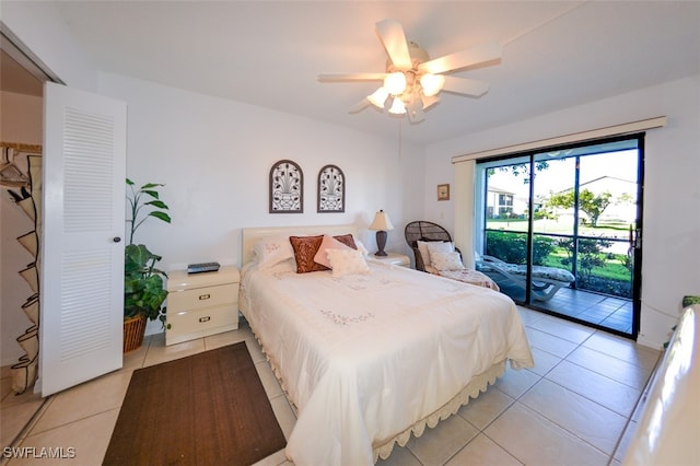 bedroom featuring ceiling fan, light tile patterned floors, and access to outside