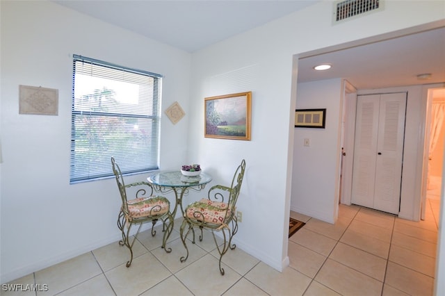 view of tiled dining space