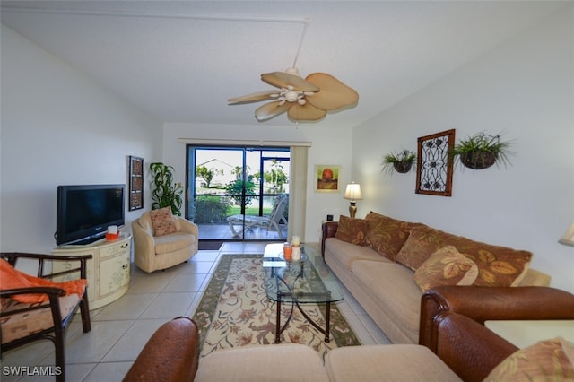 tiled living room featuring ceiling fan