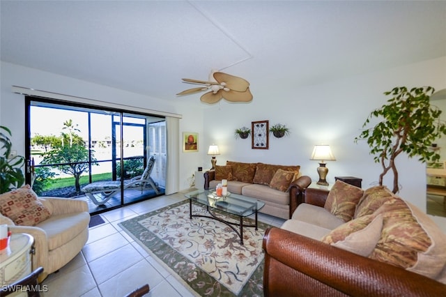 living room featuring ceiling fan and light tile patterned floors