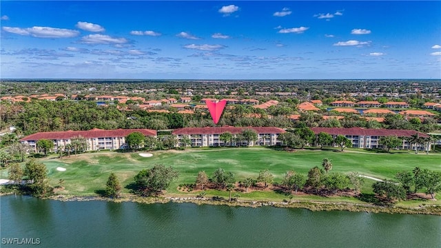 birds eye view of property featuring golf course view and a water view