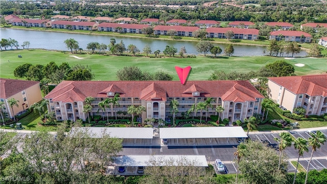 drone / aerial view with a water view