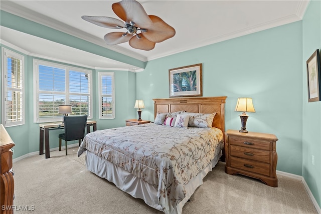 bedroom featuring ceiling fan, crown molding, and light colored carpet