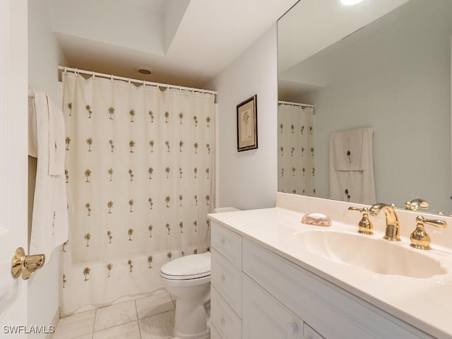 full bathroom with tile patterned flooring, vanity, shower / tub combo, and toilet