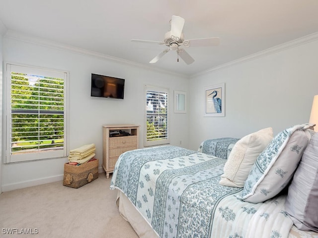 bedroom with light colored carpet, ceiling fan, and ornamental molding