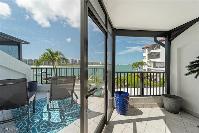 balcony featuring a water view