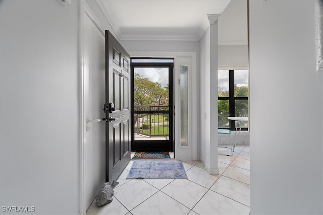 entrance foyer featuring ornamental molding