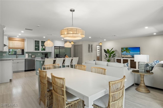 dining area featuring sink