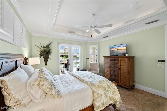 bedroom featuring access to outside, french doors, ceiling fan, ornamental molding, and a tray ceiling