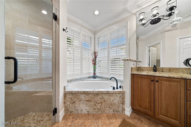 bathroom featuring tile patterned floors, vanity, ornamental molding, and independent shower and bath