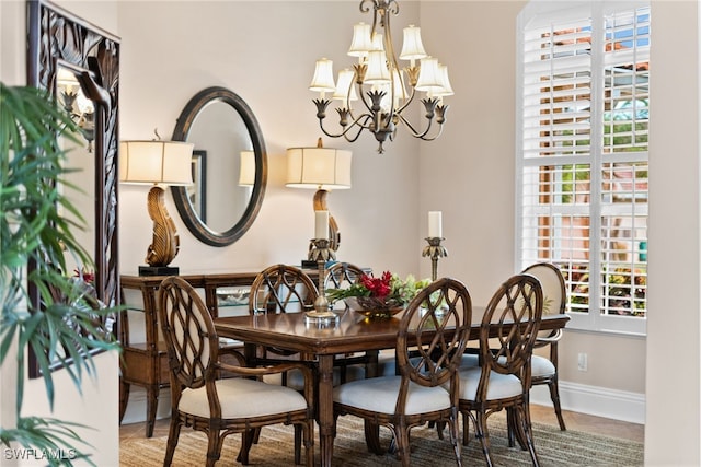 dining room with a chandelier