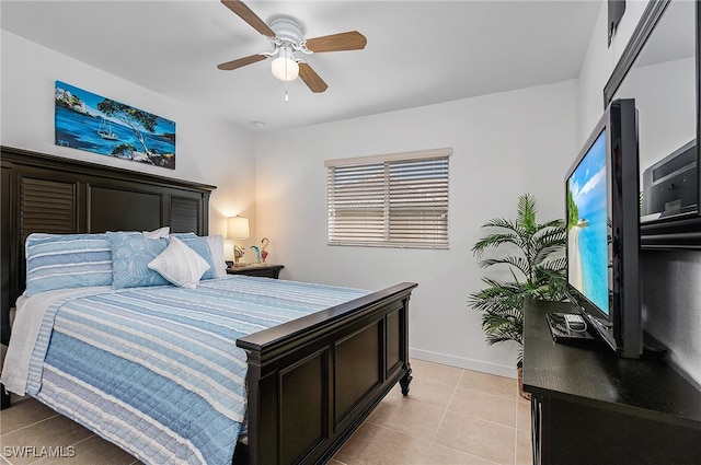 bedroom with light tile patterned floors and ceiling fan