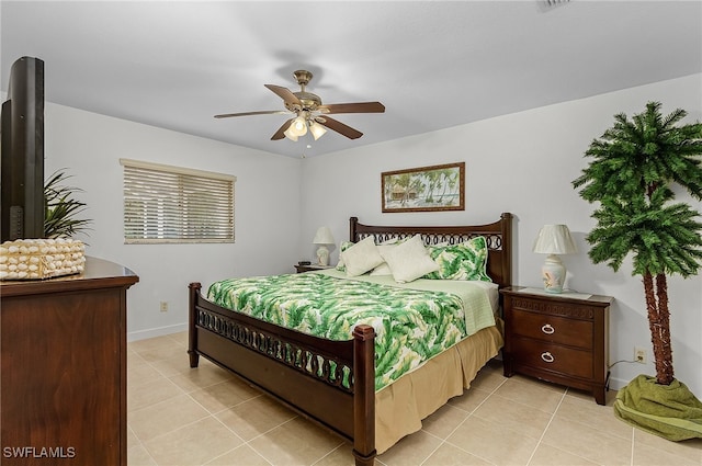 bedroom featuring light tile patterned floors and ceiling fan