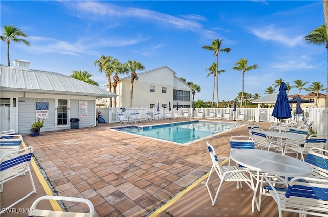 view of swimming pool featuring a patio