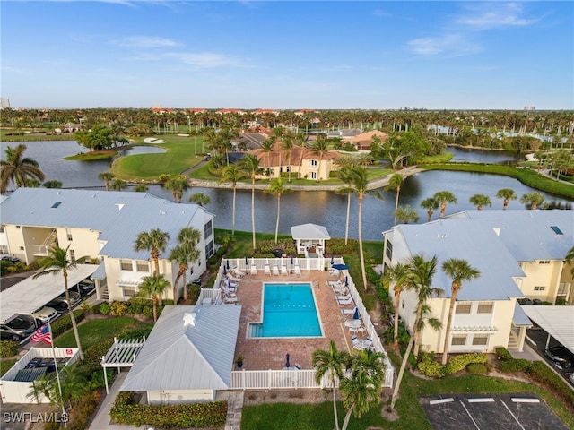 birds eye view of property with a water view