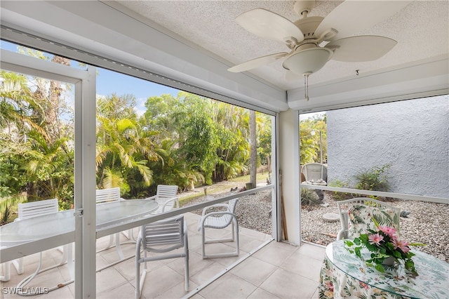 34 Watercolor Way Unit 34, Naples, FL 34113 - sunroom / solarium featuring outdoor dining space, a ceiling fan, and healthy amount of natural light