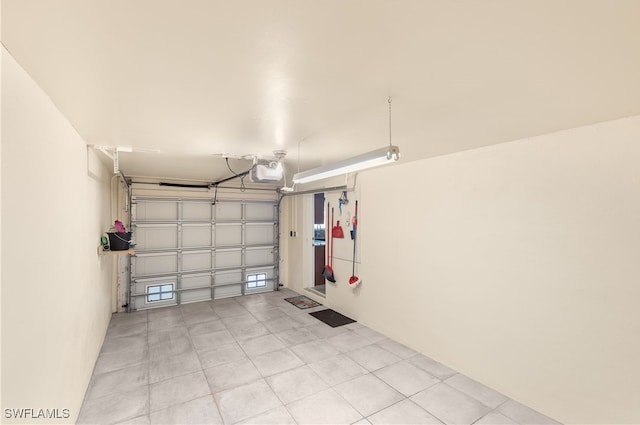 34 Watercolor Way Unit 34, Naples, FL 34113 - garage with a garage door opener