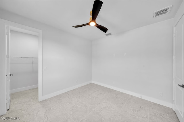 empty room with ceiling fan