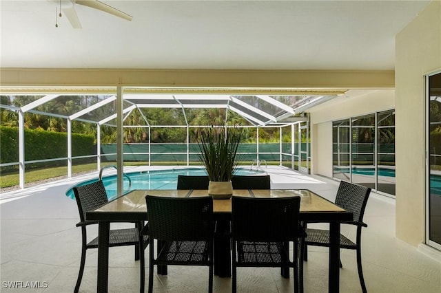 view of patio featuring a fenced in pool and a lanai