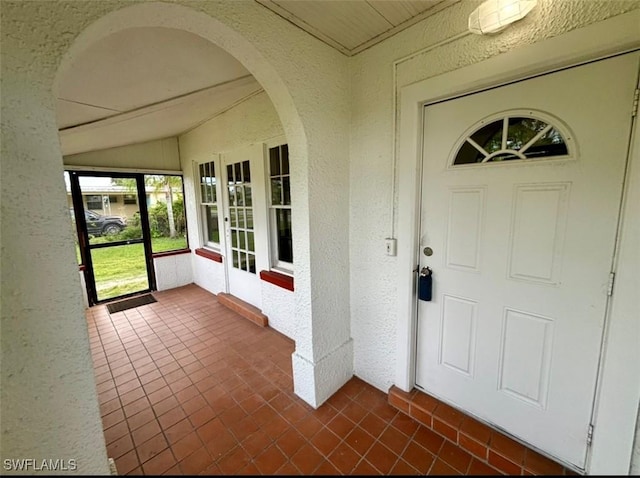 property entrance featuring french doors