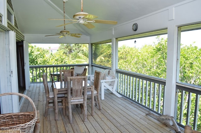 wooden terrace featuring ceiling fan