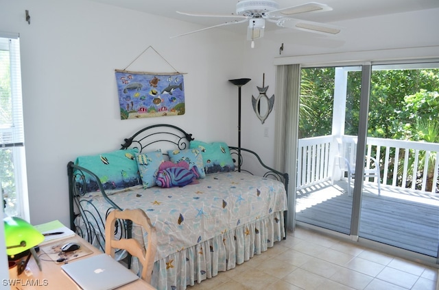 tiled bedroom with access to exterior, ceiling fan, and multiple windows