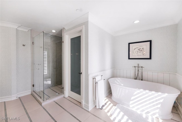 bathroom with tile patterned floors and plus walk in shower